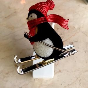 Bath and Bodywork’s Wallflowers fragrance plug in penguin skiing light holiday